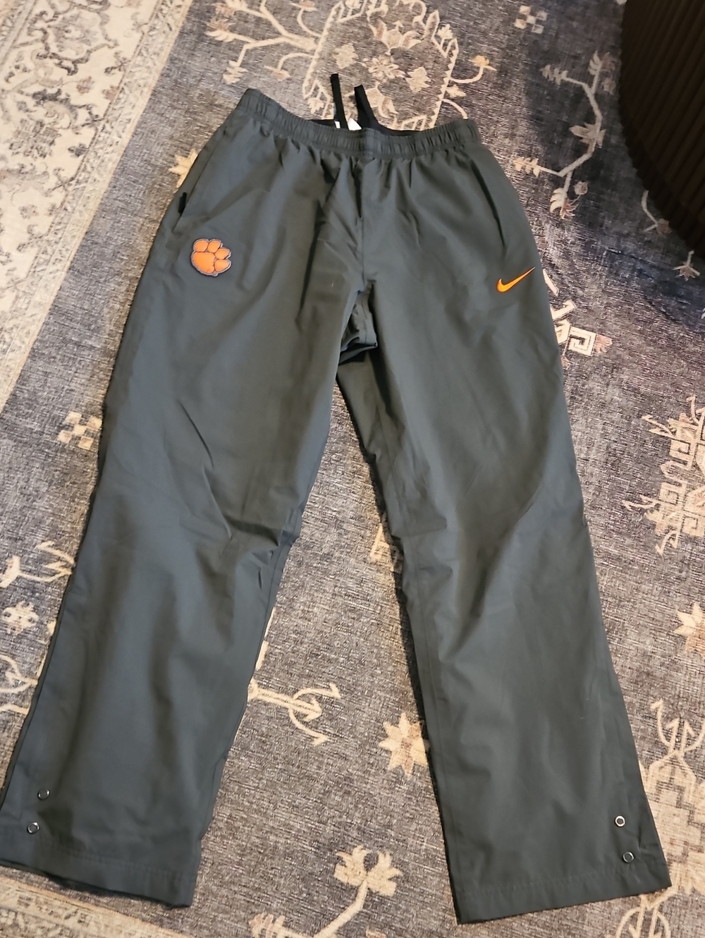 Nike Men's Dark Green Track Pants with Orange Logo